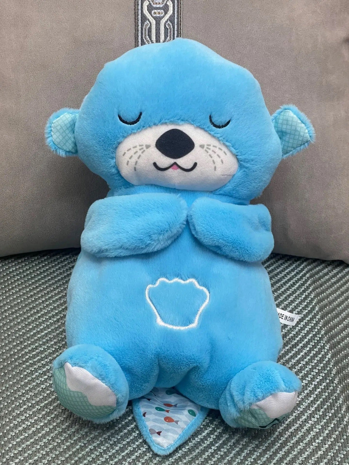 Peluche respirante, sonore et lumineuse